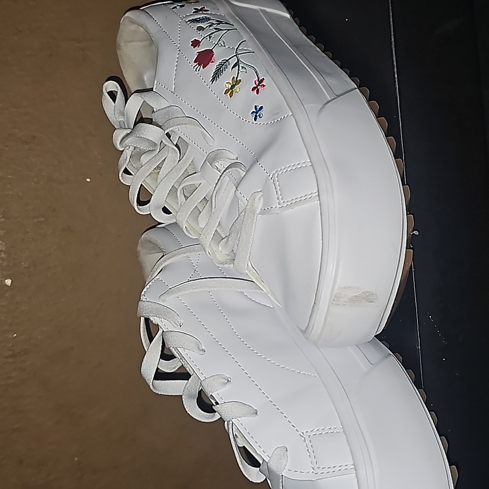 White Platform Pumas with pink and blue Flowers on side